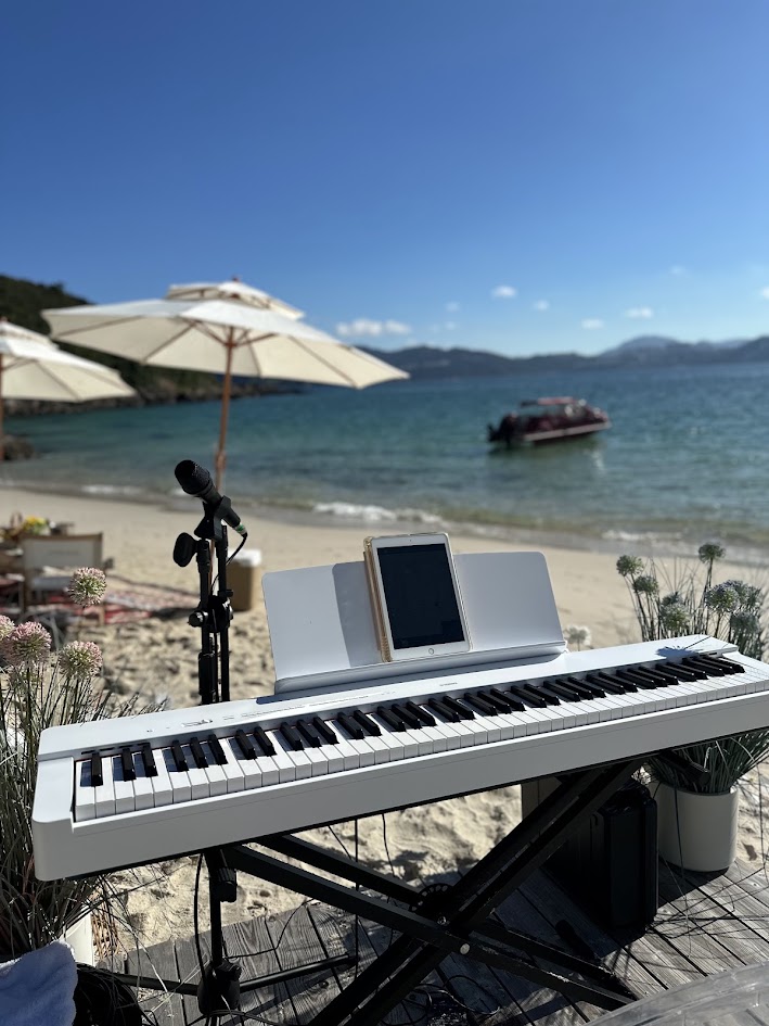 Live music setup overlooking a Sai Kung beach