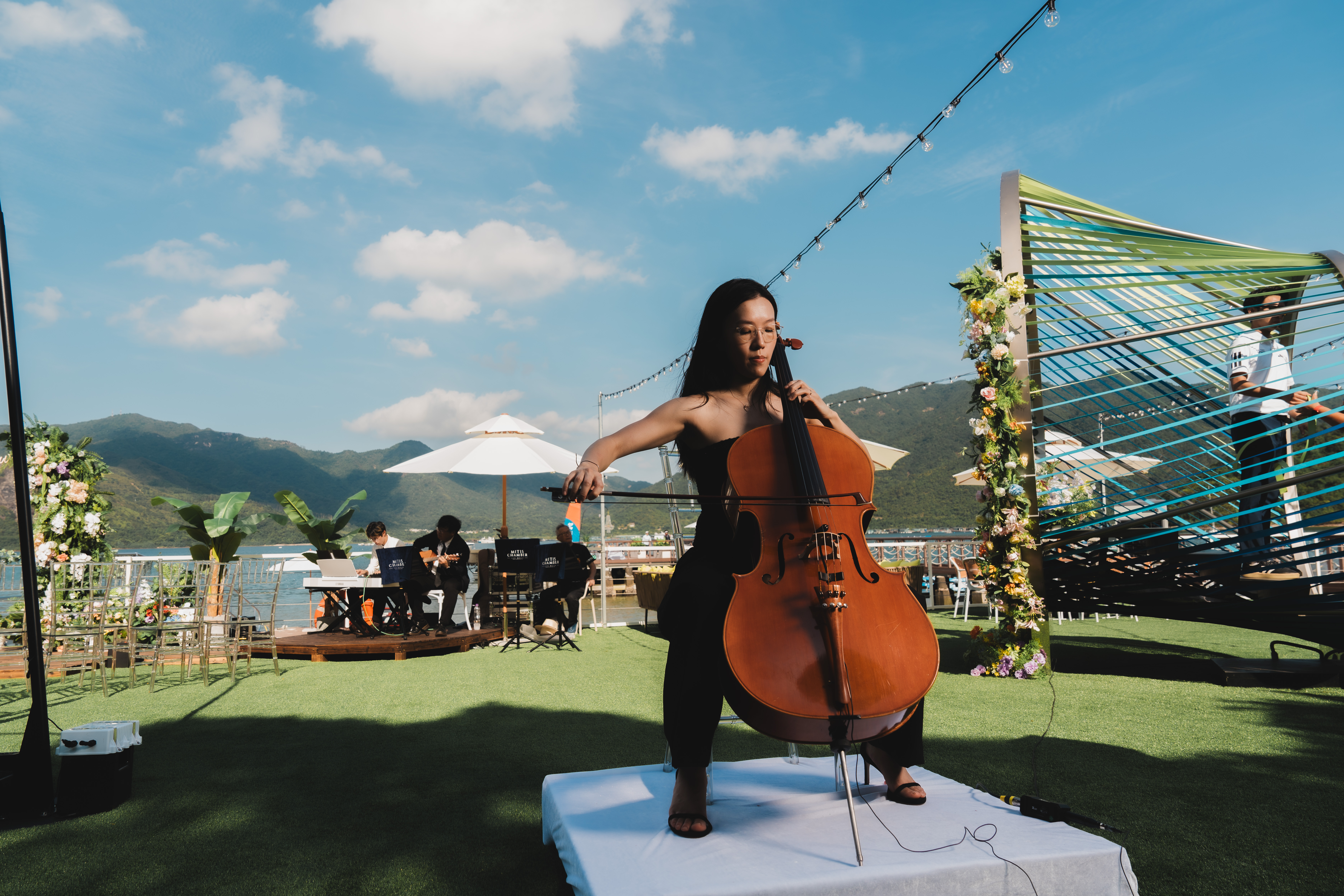Live music at a Goofy Waves waterfront wedding celebration